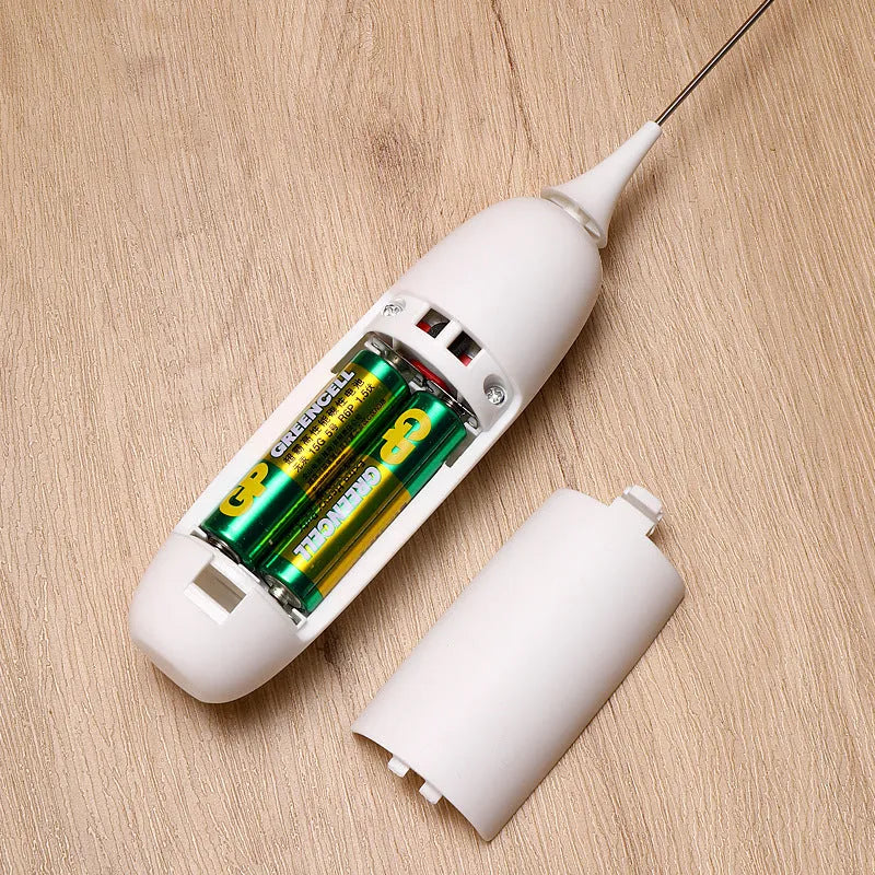 Hand-held electric milk frother blender in black or white colour for coffee preparation