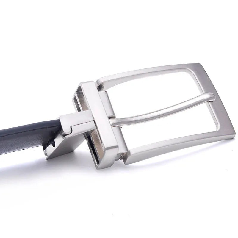 Men's dark brown genuine leather belt with a rotating silver alloy pin buckle on a wooden surface