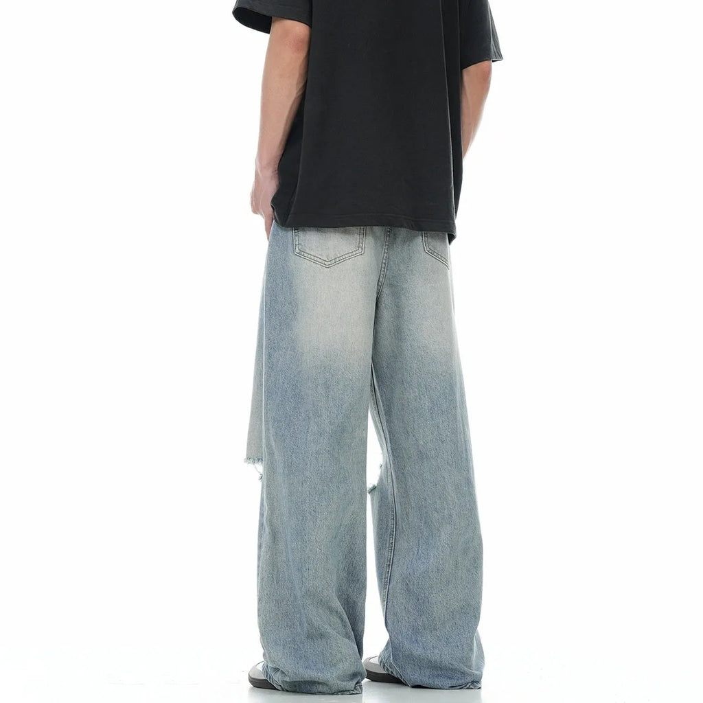 Blue retro straight-leg jeans with distressed detailing and adjustable waistband