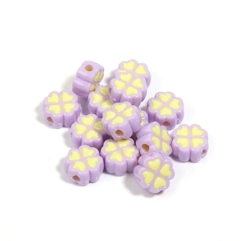 15mm acrylic four-leaf clover beads with frosted finish in light colours including pink, yellow, green and blue