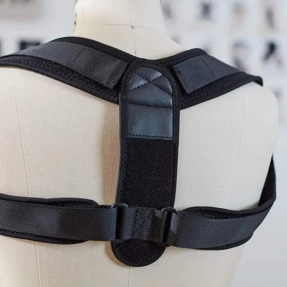 Black adjustable posture correction strap for back and shoulder support