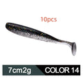 Close-up of a two-tone T-tail soft plastic fishing lure measuring 7cm, shown in a vibrant colour pattern.