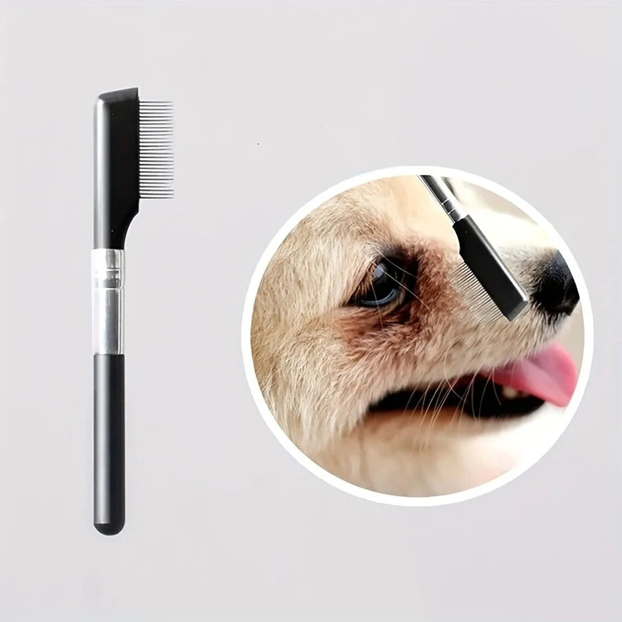 Black handheld pet grooming brush with a soft silicone head for eye tear stain removal.