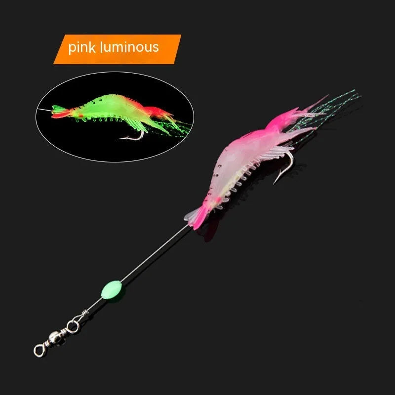 Soft plastic fishing lure with metal hook in black head yellow body colour variant