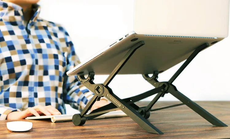 Black folding portable laptop stand with reinforced nylon construction showing adjustable height mechanism
