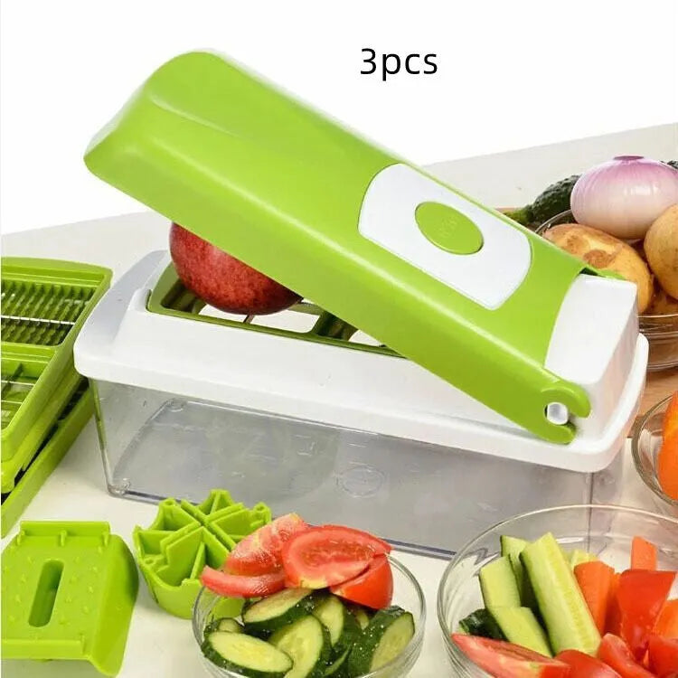 Green manual vegetable chopper with stainless steel blades and handheld design for kitchen food preparation