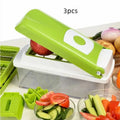 Green manual vegetable chopper with stainless steel blades and handheld design for kitchen food preparation