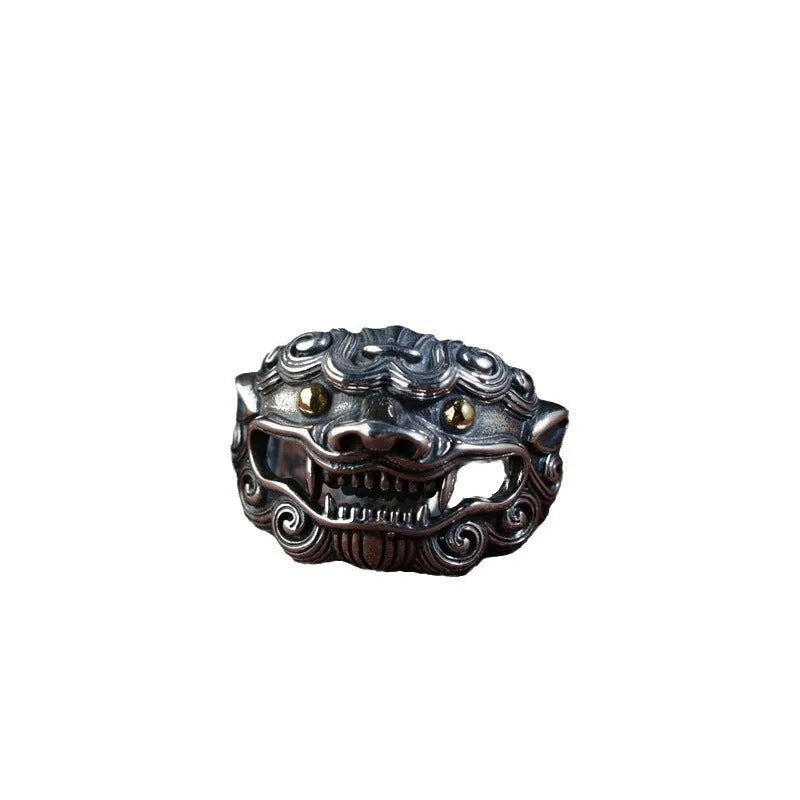 Detailed silver open ring featuring an animal zodiac beast pattern on a model's finger.