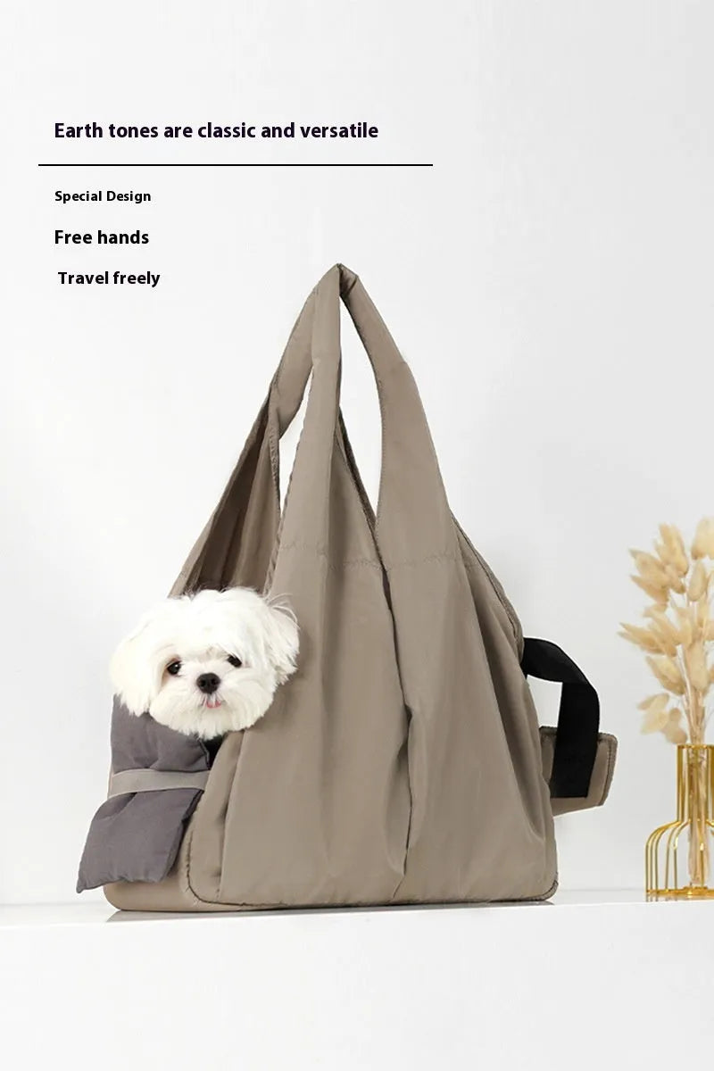 Apricot-coloured cloth pet handbag for small dogs measuring 41x16x28 cm