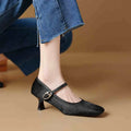 Women's black square toe stiletto ankle-strap shoes with horse hair upper and buckle closure