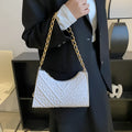 Brown pleated chain baguette shoulder bag with adjustable strap and soft carry handle