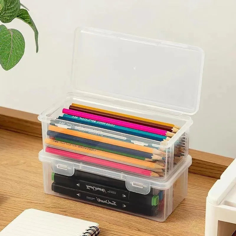 Transparent plastic stationery storage box for pencils, crayons, and art supplies