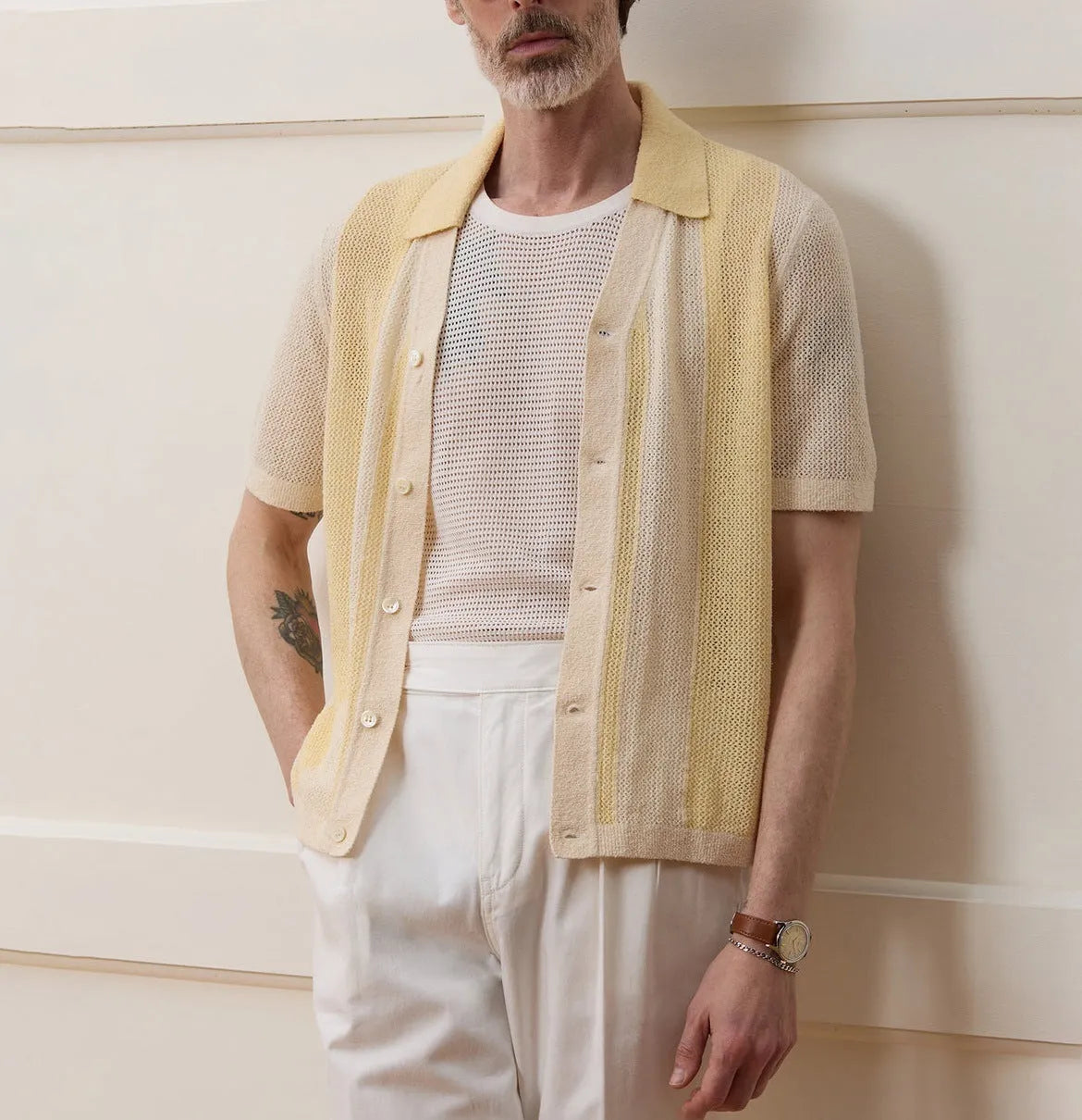 Yellow casual polo shirt with hollow-out detailing and asymmetric design, short sleeves for summer wear