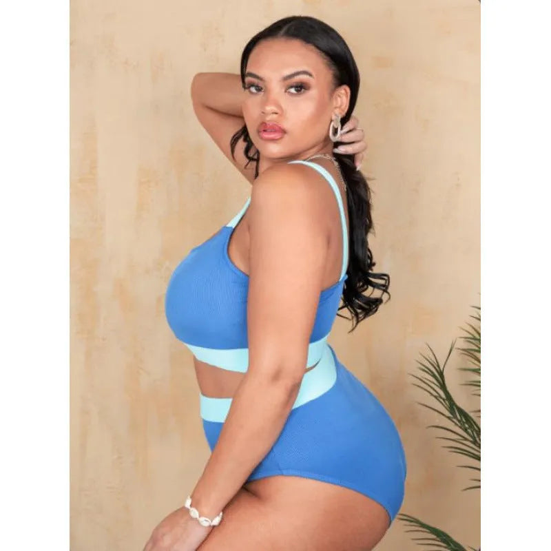 Women's solid colour bikini set with high waist briefs and stitching detail.