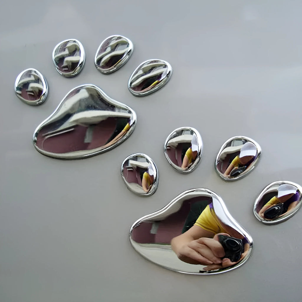 PVC car sticker pair with hand-shaped brush design showing dog footprints in multiple colour options