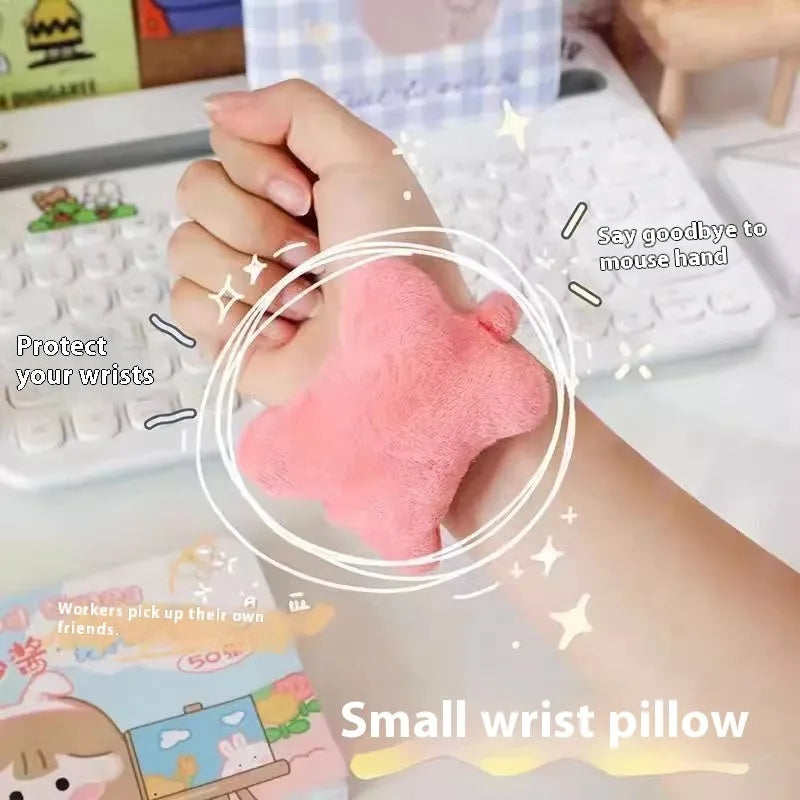 Plush wrist protector mouse pad in blue colour on computer desk with keyboard