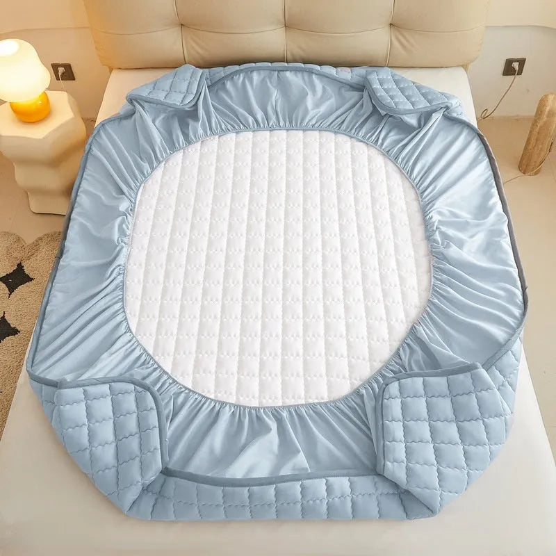 Class A waterproof washed cotton fitted bed sheet shown in light grey, fitted over a mattress.