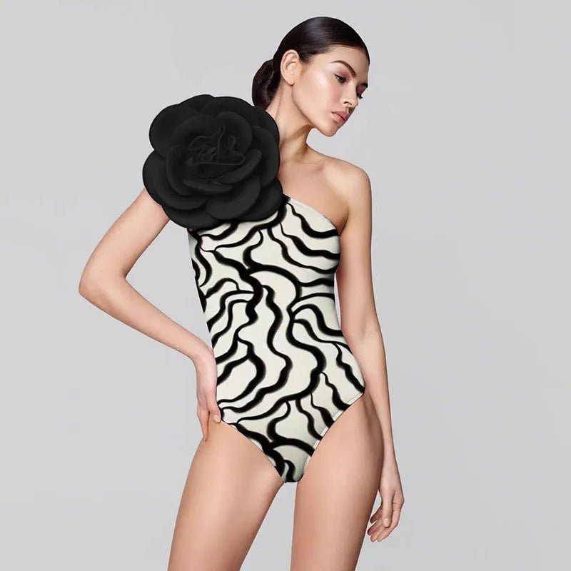 Nylon one-piece swimsuit with floral print, shown in European and American fit.