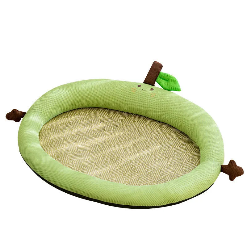 Green pet cooling mat with raised fruit backrest for dogs or cats on a wooden floor