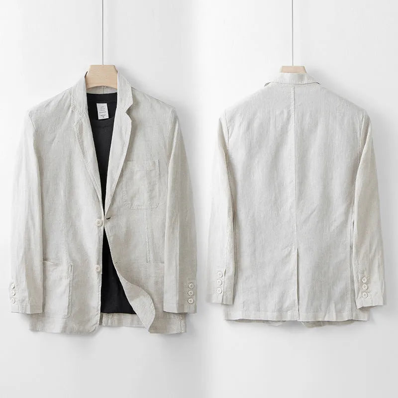 Men's casual linen suit jacket in a solid colour on a hanger, showing long sleeves and loose fit.