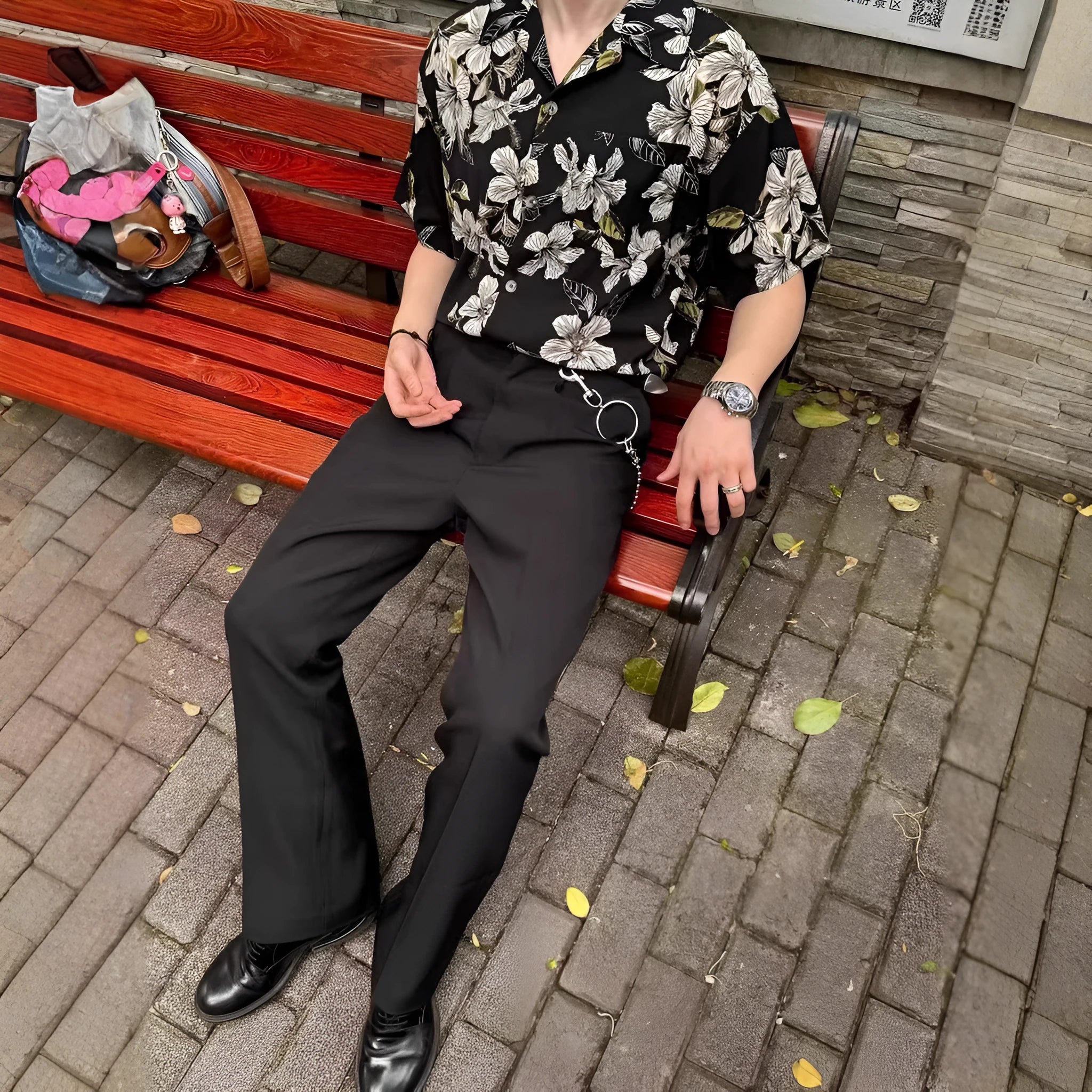 Black men's vintage Cuban collar shirt with floral print, made from ice silk fabric with short sleeves.