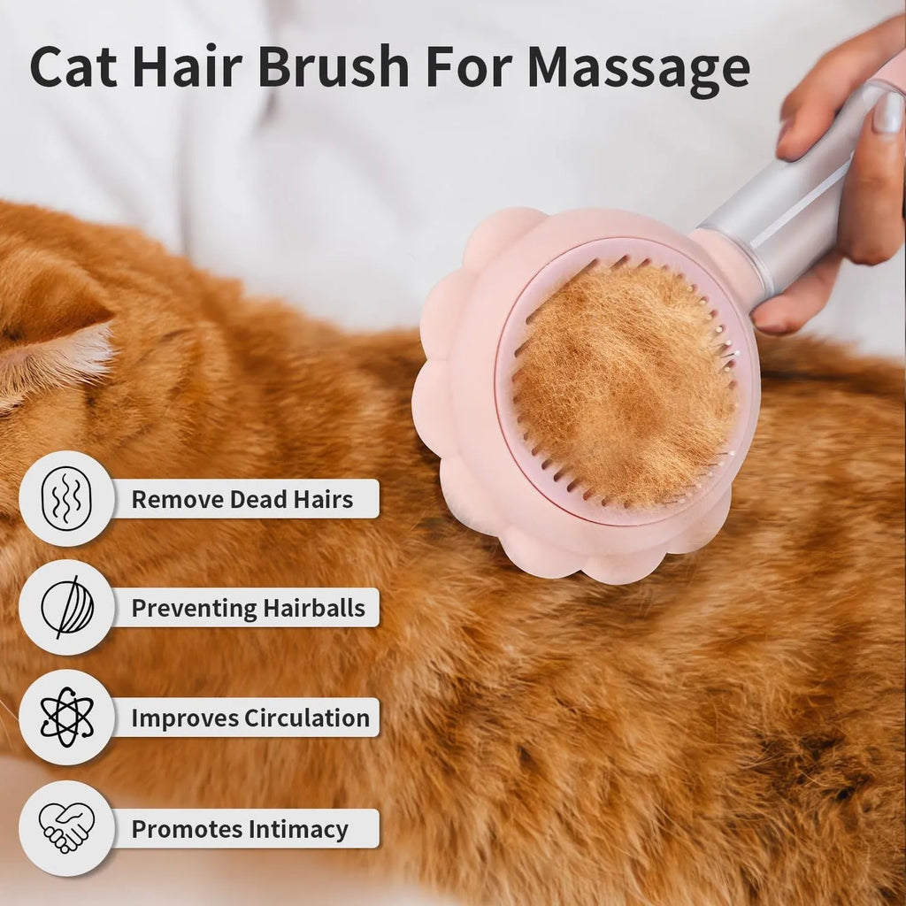 Grey spray cat grooming brush with a release button and stainless steel bristles on a wooden table.
