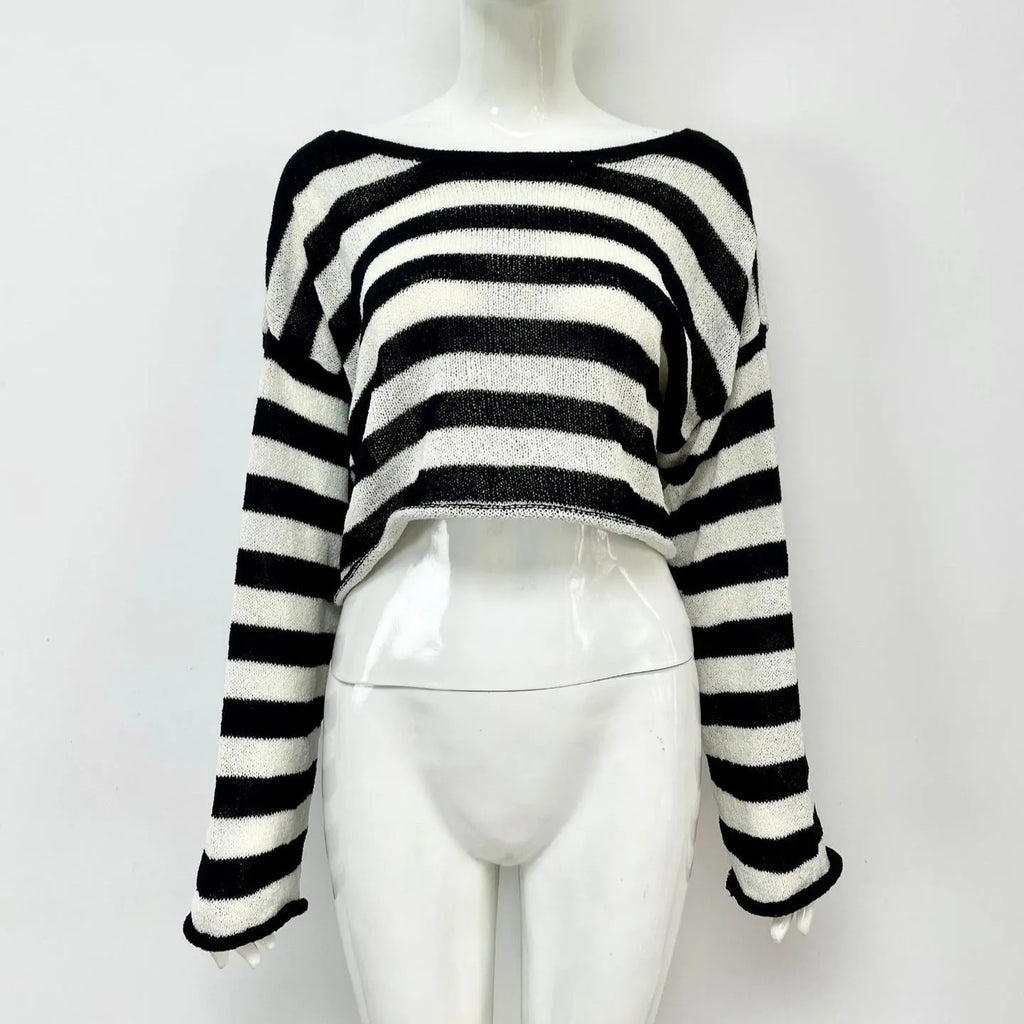 Women's black and white striped long-sleeved sweater with exposed navel front and back design.