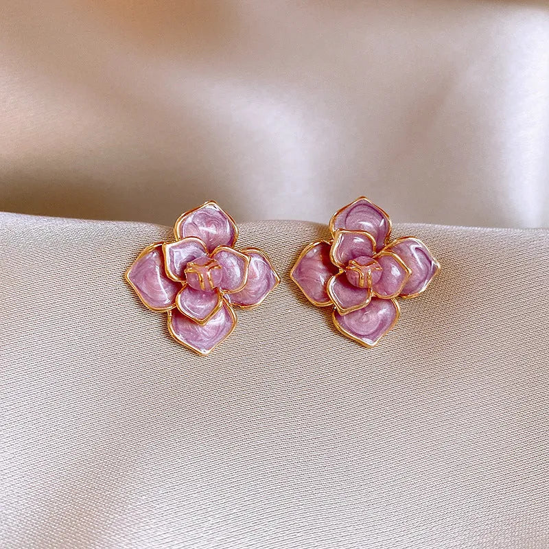 Purple oil-spot glaze flower stud earrings with gold plated silver needle elements on copper base