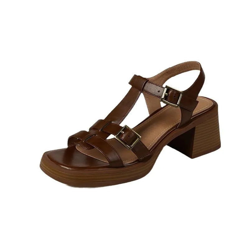 Women's black retro sandals with T-buckle fastening and chunky platform heel