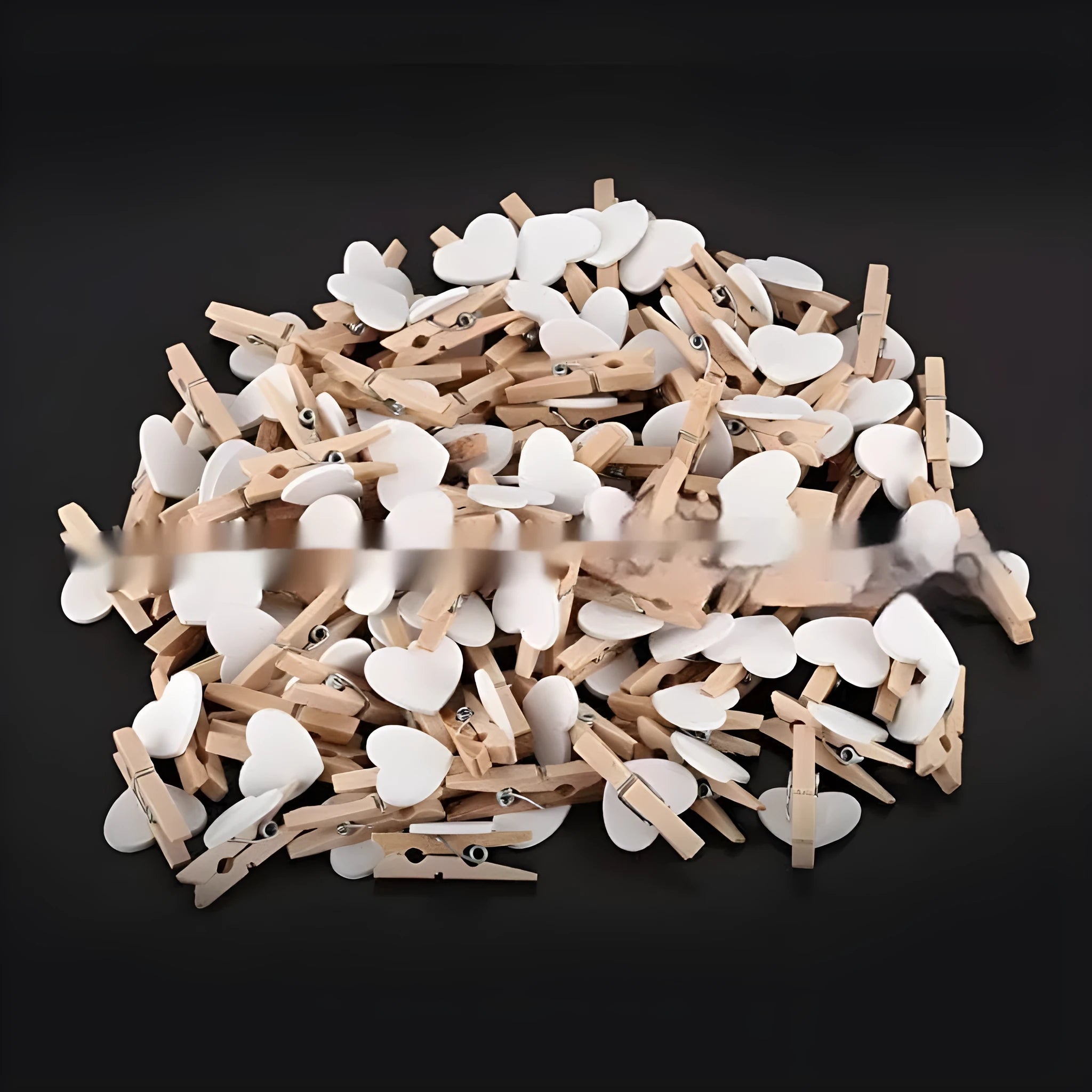 Set of five handmade solid wood heart-shaped clips in various colours