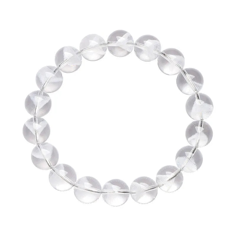 Women's white crystal ghost pyramid bracelet with Ruyi design elements on a wrist.