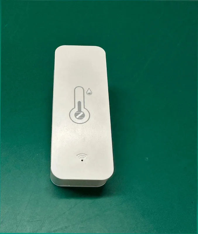 White WiFi temperature humidity sensor with compact rectangular design showing digital display