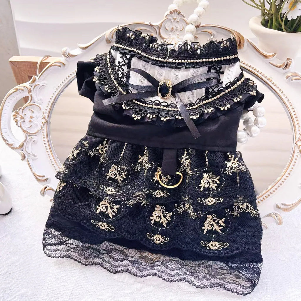 Golden Gothic-style princess skirt costume for a small dog or cat on a mannequin.