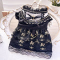 Golden Gothic-style princess skirt costume for a small dog or cat on a mannequin.