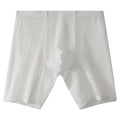 Men's lengthened lace boxer shorts in transparent nylon construction showing shaping design