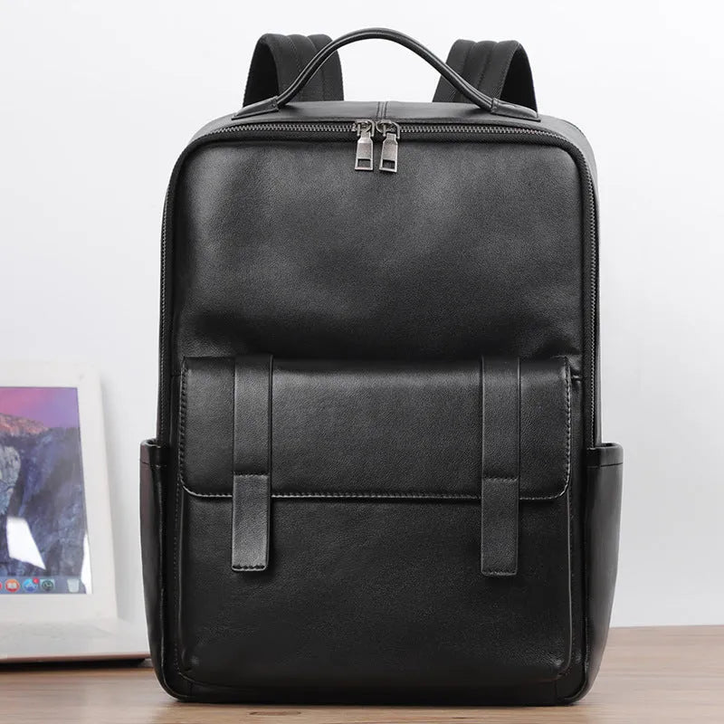 Men's large black leather computer backpack with 36-55L capacity for business and travel