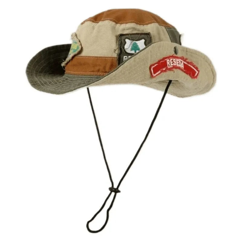 Army green cotton foldable fisherman hat with patchwork details and flat top crown