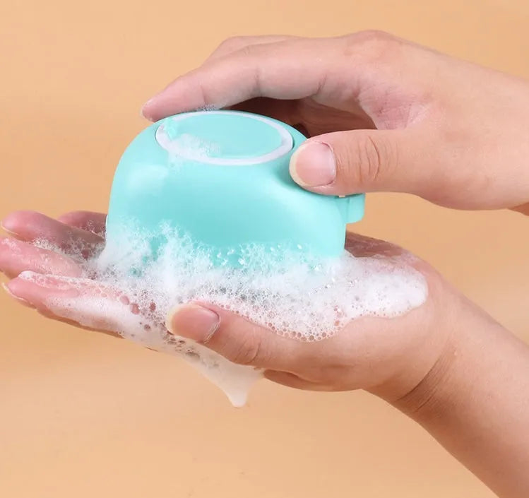 Silicone dog bath massage brush in blue, pink, and yellow colour options