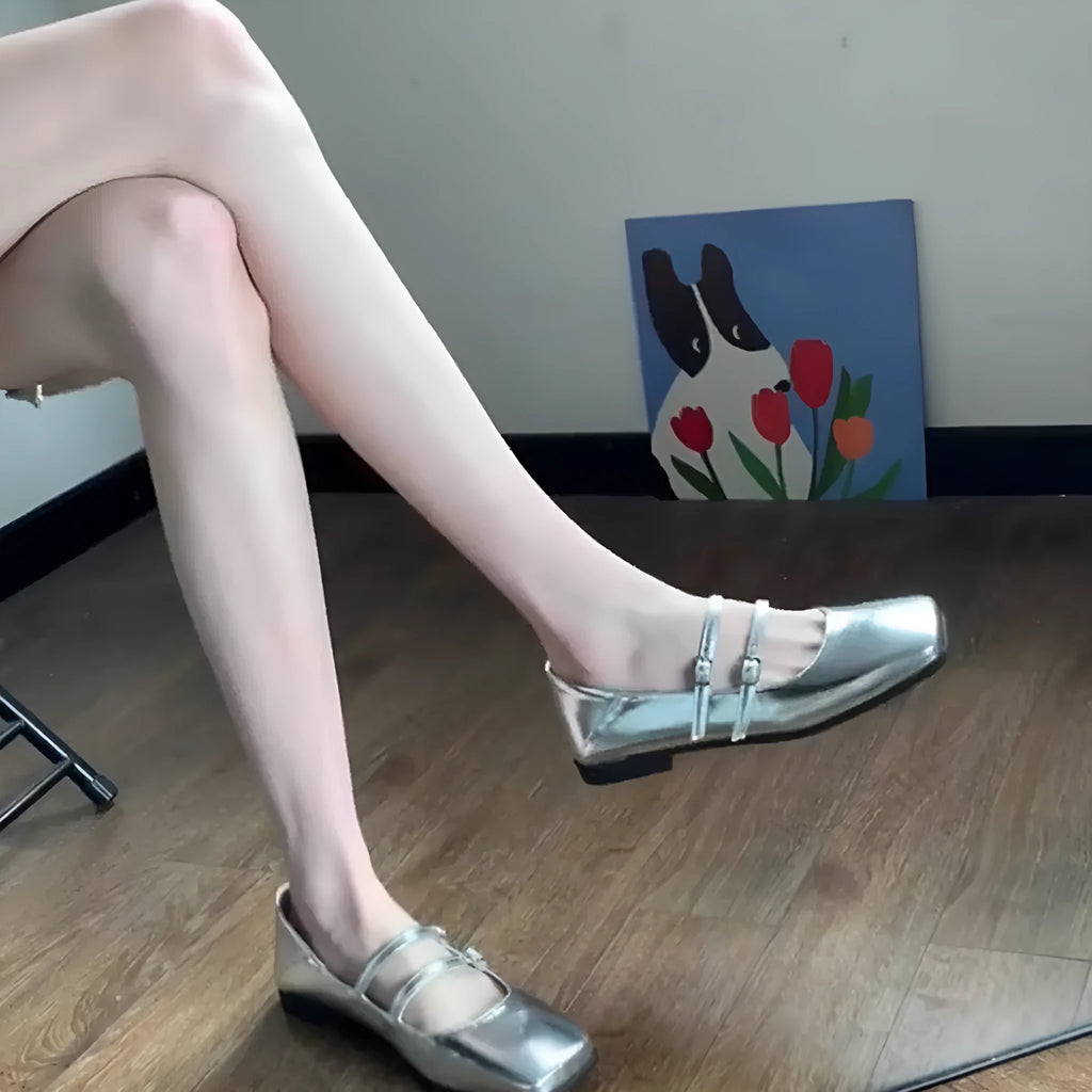 Women's silver leather ballet flats with cross buckle strap and flat sole