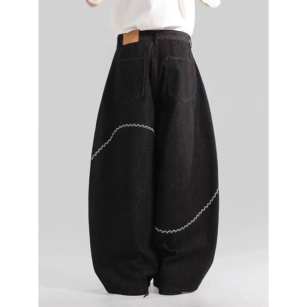 Black straight-leg men's trousers with mid-waist design and zip fly placket in micro-elastic polyester denim fabric