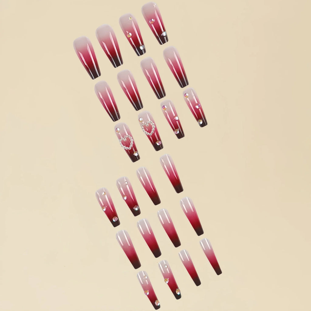 Wine red gradient fake nail tips with a pearl heart and plaid design in a long ballet shape.
