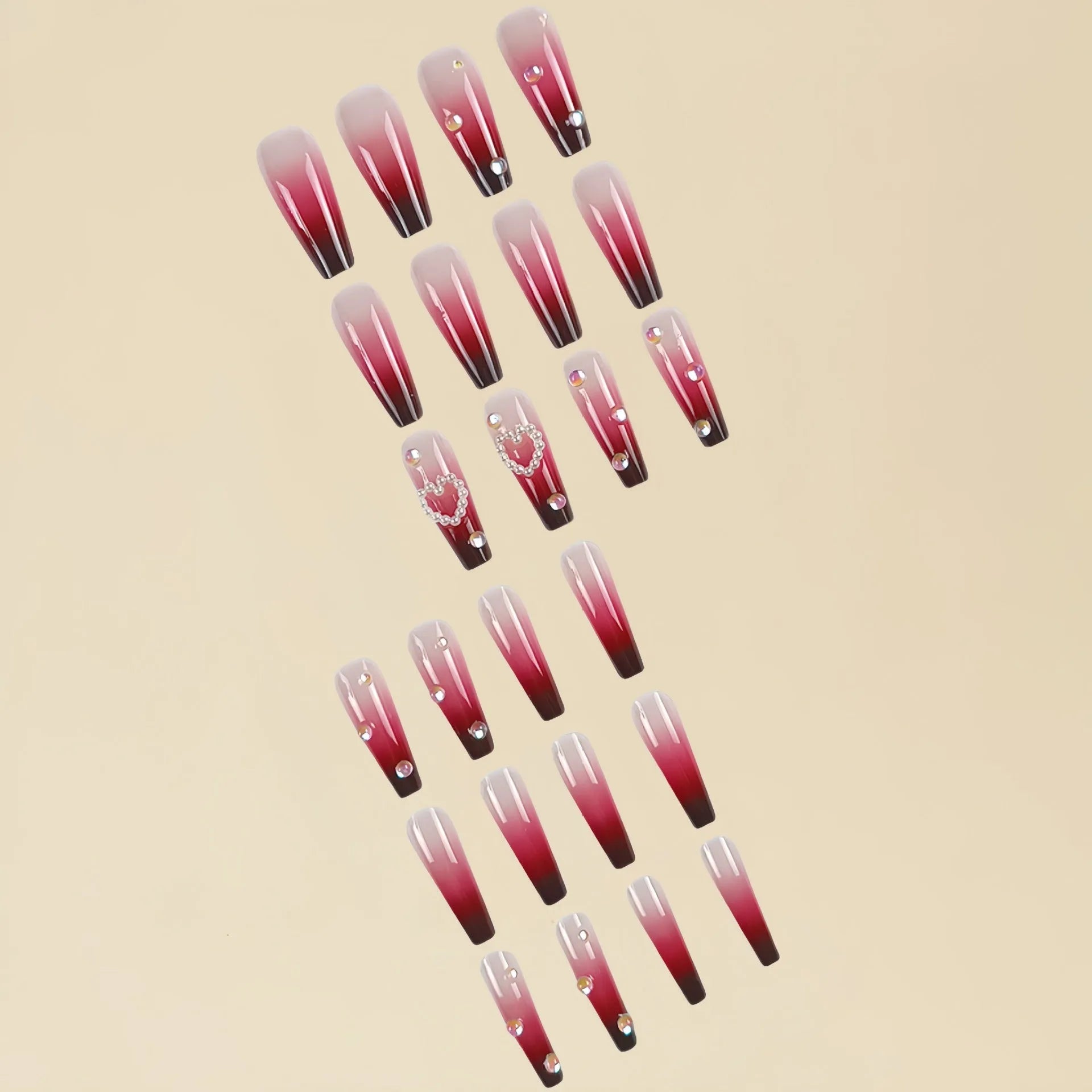 Wine red gradient fake nail tips with a pearl heart and plaid design in a long ballet shape.