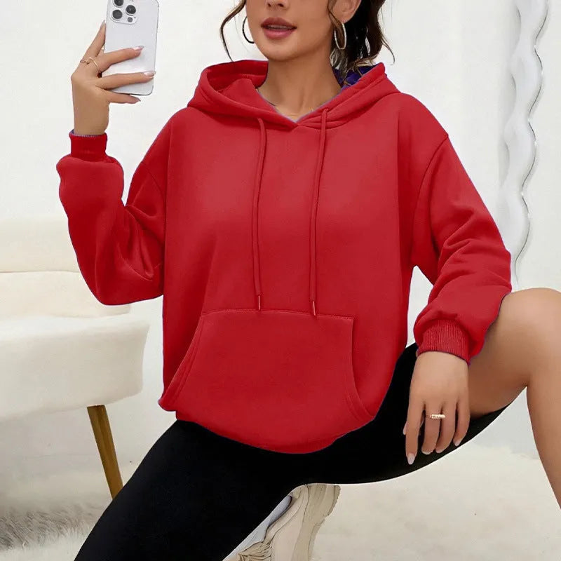 Women's loose fit long sleeve sweatshirt with drawstring and front pocket in multiple colour options