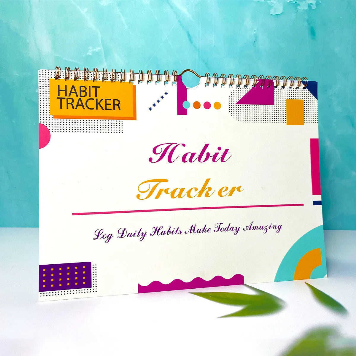 English habit tracking notebook with 12 pages in 21x28cm format showing four colour options