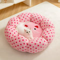 Pink dot fabric cat bed with fully cushioned design in 45cm and 65cm diameter sizes