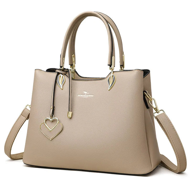 Women's black PU leather shoulder messenger bag with multi-layer compartments and sewing thread detailing