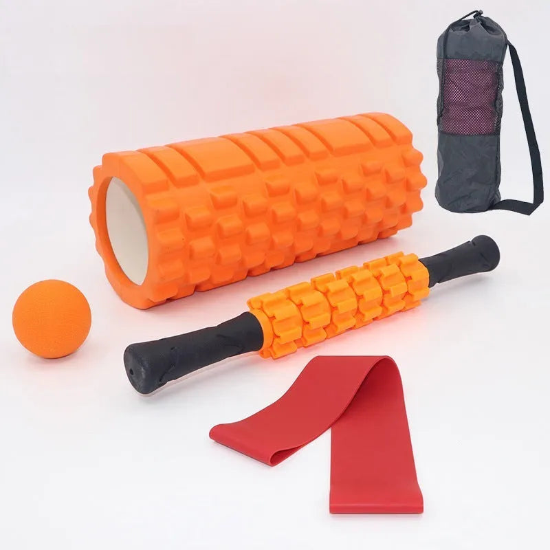 Black fitness foam roller massage bar measuring 33cm long on a plain background.