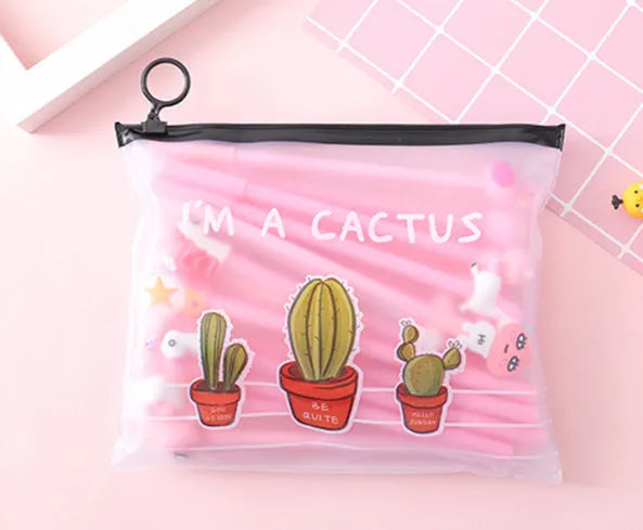 20 cartoon cactus design black gel pens inside a white plastic storage case.