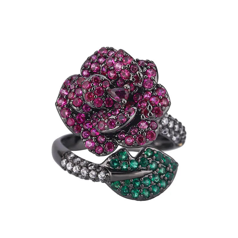 Geometric black gold personality ring with red corundum stones