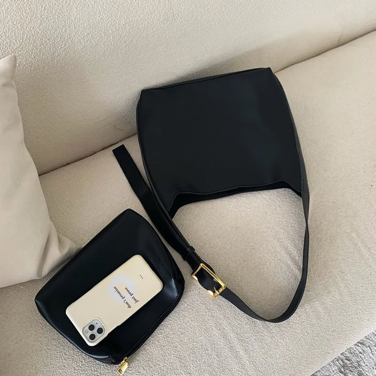 Women's soft PU leather shoulder bag with swing thread details in black or brown, showing dimensions of 28x32x12cm.